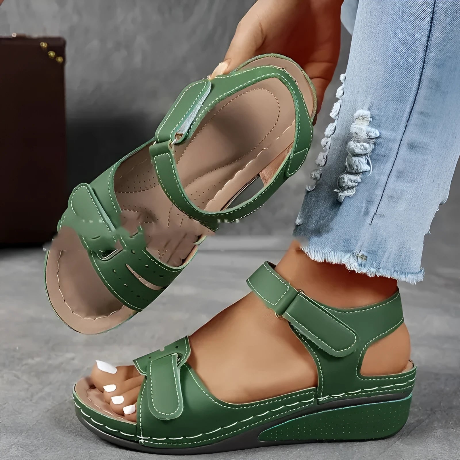 Women's thick bottom strap sandals with Velcro fastening in beige colour showing round toe and composite sole