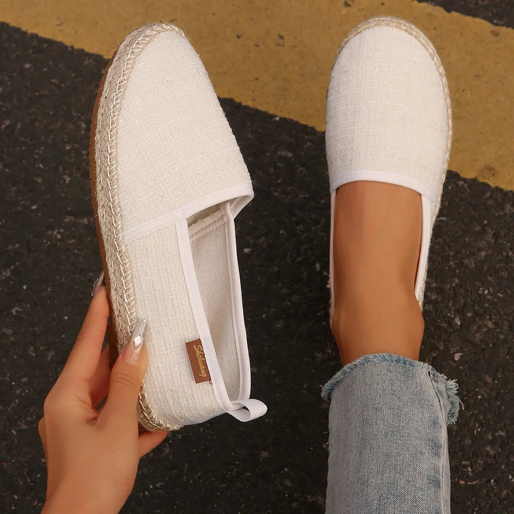 Casual fisherman shoes with canvas upper and rope sole bottoms in black, white and beige colours