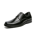 Men's black square toe business casual leather shoes with rubber sole on wooden background