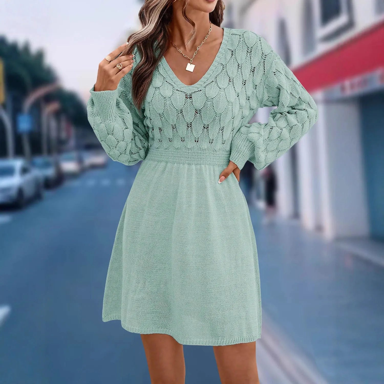 Artistic retro ethnic V-neck beach dress with 3D pattern, long sleeves, and high waist.