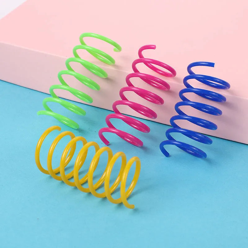 Mixed colour plastic cat spring toys measuring 5.5cm long for kitten and cat play