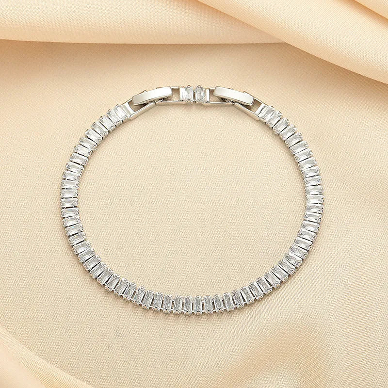 Women's geometric brass bracelet with zircon stones in rectangular design