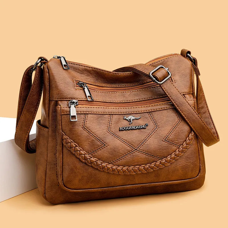 Soft PU leather women's shoulder bag in blue colour with crossbody strap
