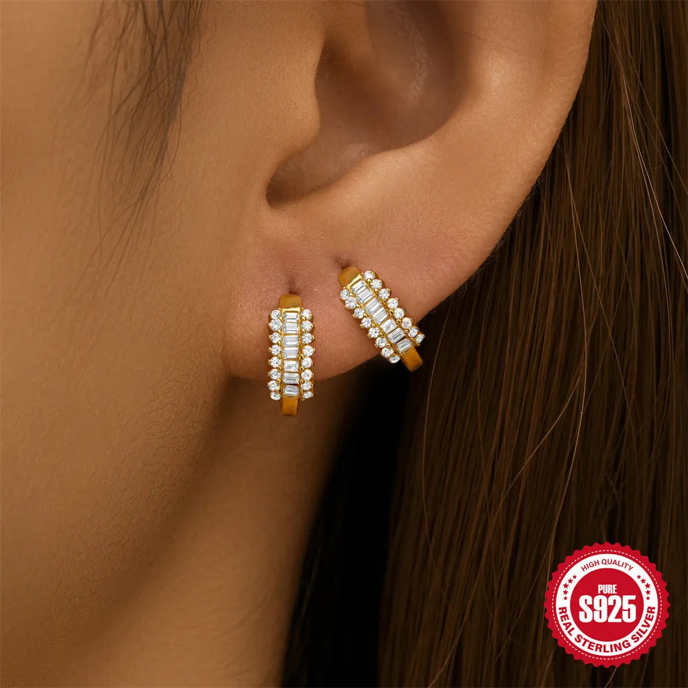 Geometric sterling silver stud earrings with small round diamond-inspired stones in gold and silver finishes
