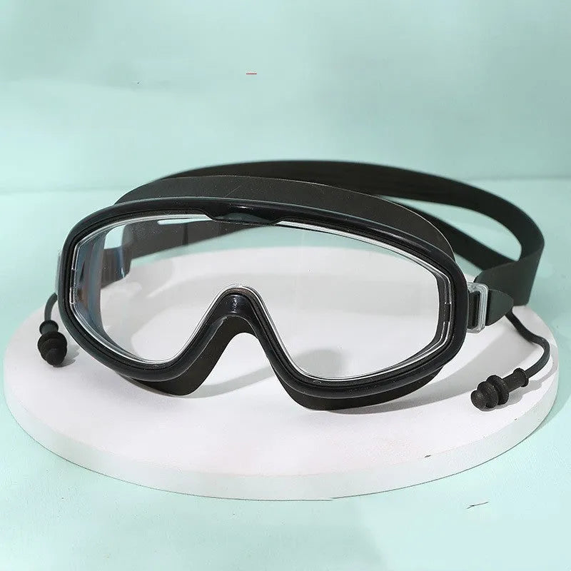 Large frame anti-fog waterproof swimming goggles for adults, transparent black colour, adjustable strap
