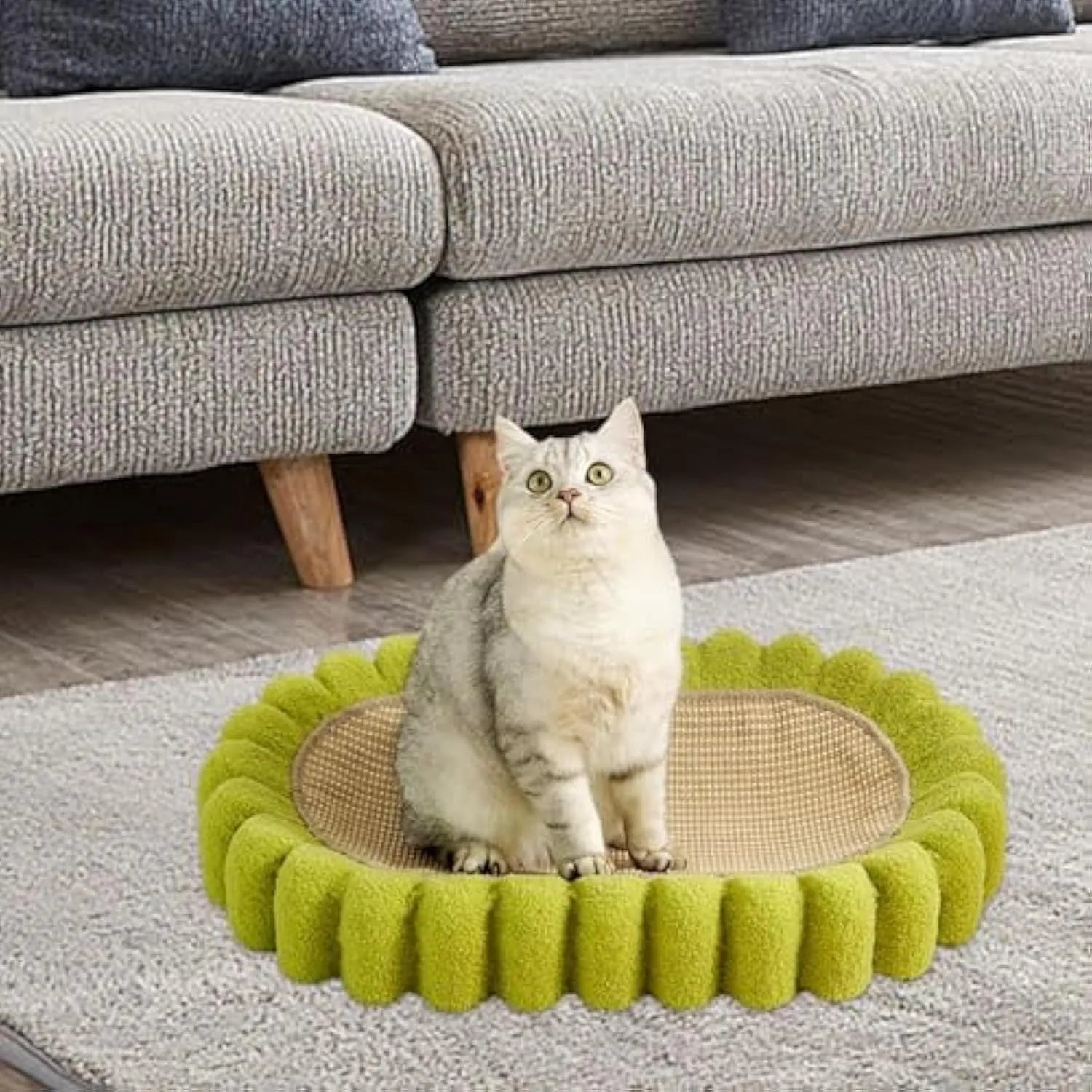 Green oval cat scratch pad bowl made of sisal measuring 650mm x 420mm