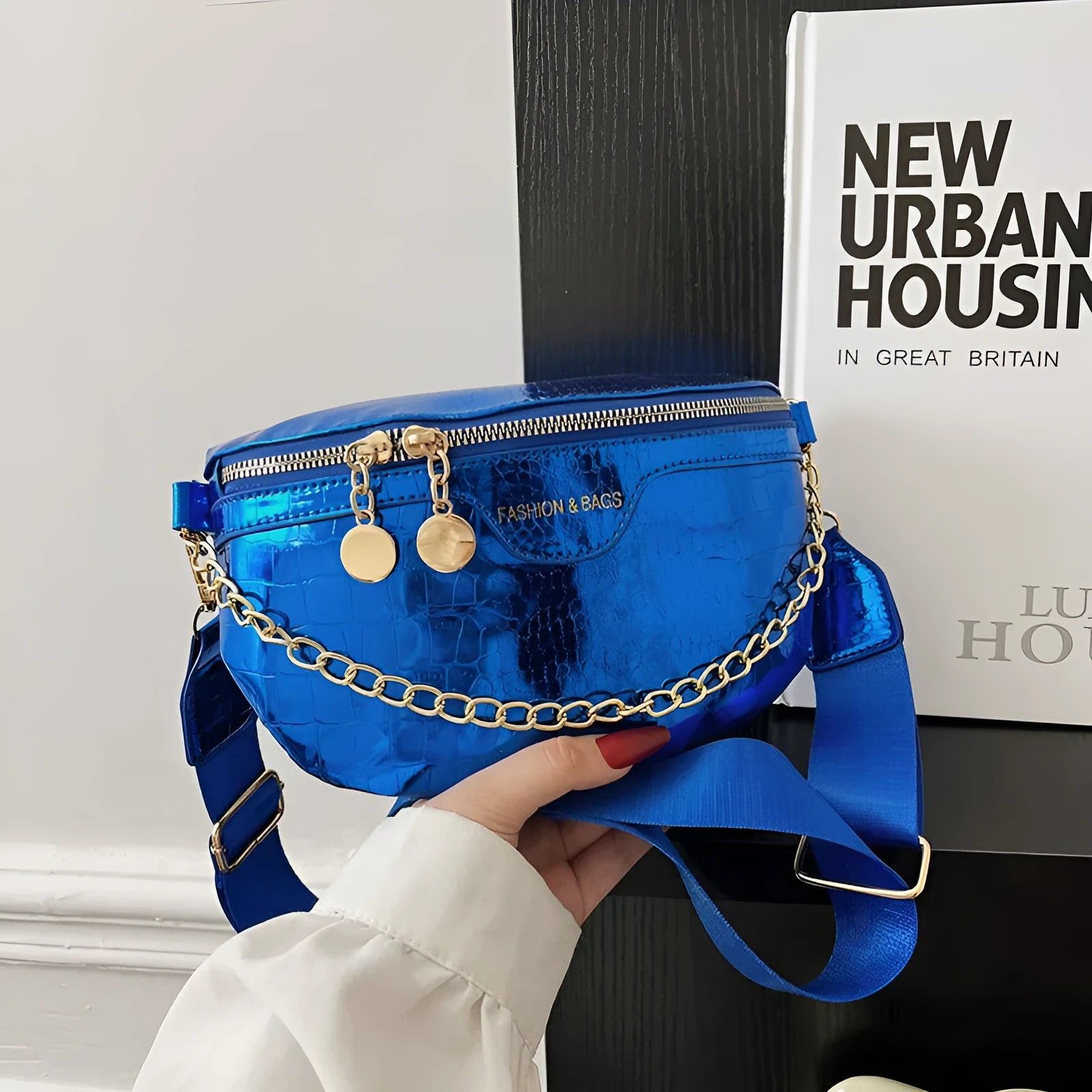 PU chain messenger bag with shoulder strap, sandwich outer pocket, silver colour on white background