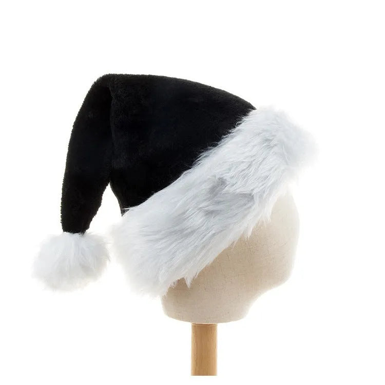 Large red and black plush Christmas hat with classic European design, shown next to a white and black version.