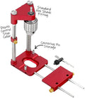 Woodworking drill locator with metal body and red or black plastic section for use on wood