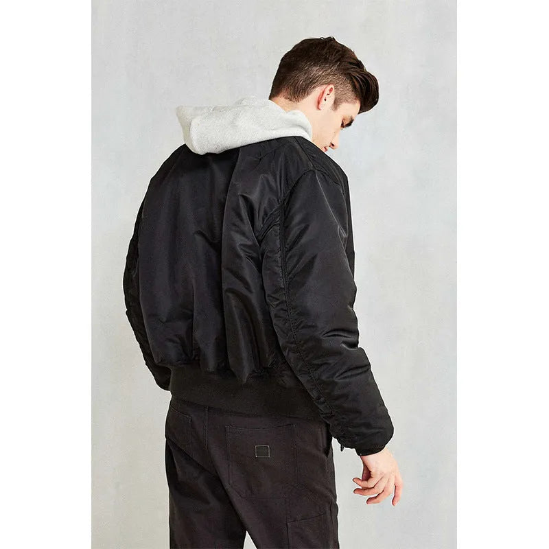 Men's loose-fit cotton-padded pilot jacket in nylon, shown in Army Green colour.