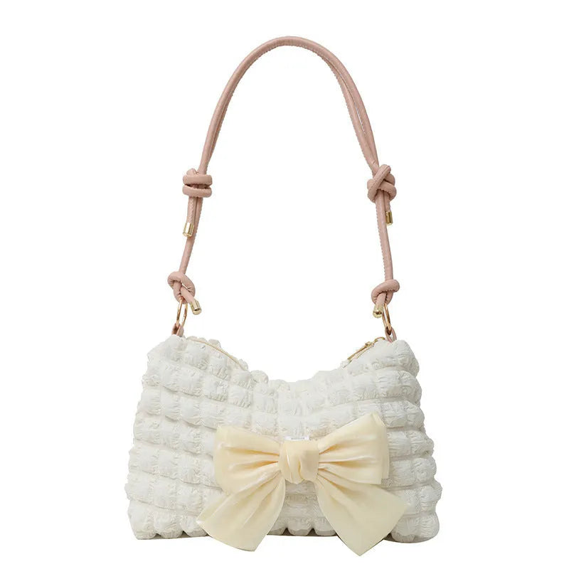 Women's canvas one-shoulder handbag in horizontal square shape with sandwich pocket design