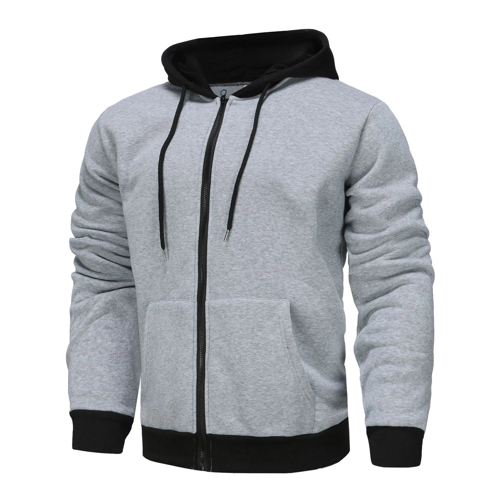 Man wearing a black zip-up hooded cardigan with a contrasting grey hood and wool lining.