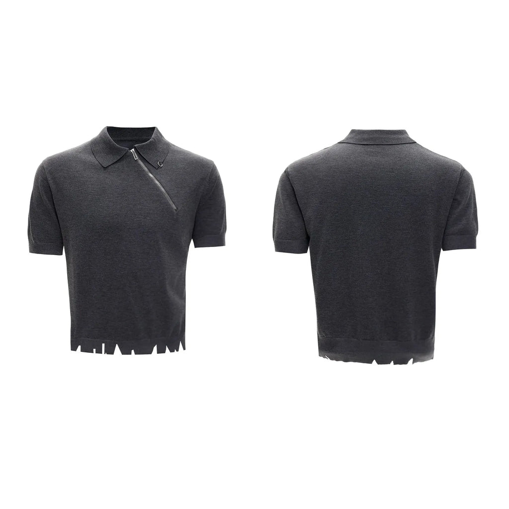 Man modelling a black slim-fit knitted polo shirt with a diagonal chest zipper and lapel collar.