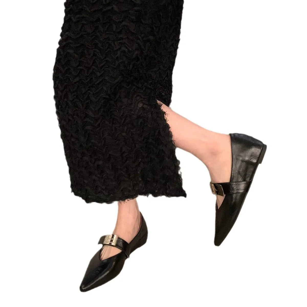 Women's black pointed toe Mary Jane pumps with buckle closure and low block heel