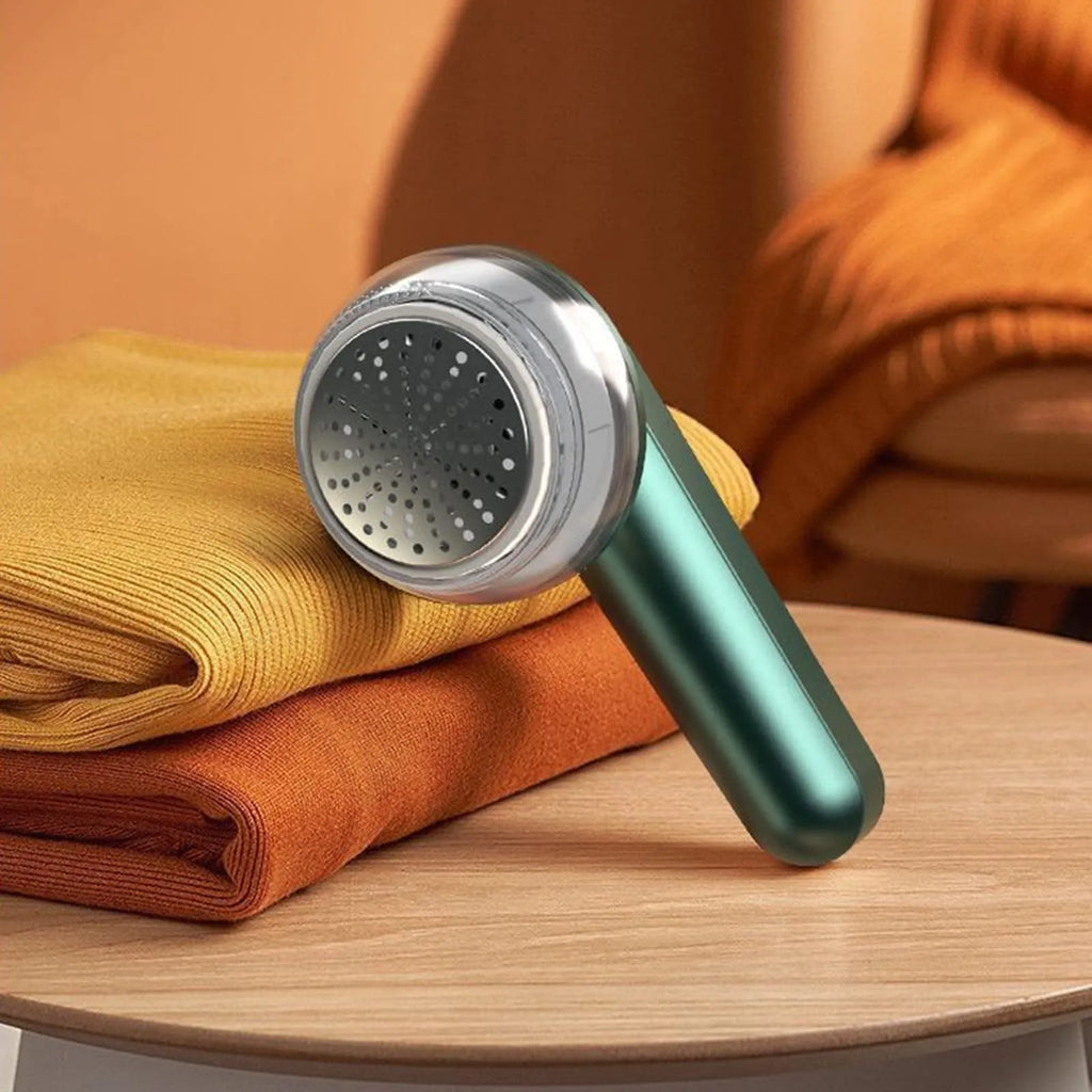 White or green USB rechargeable electric lint remover with a removable lint collection container