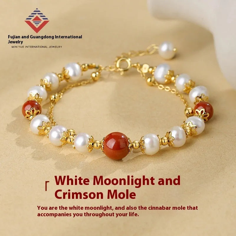Sterling silver double-layer bracelet with white freshwater pearls and cinnabar red bean geometric design