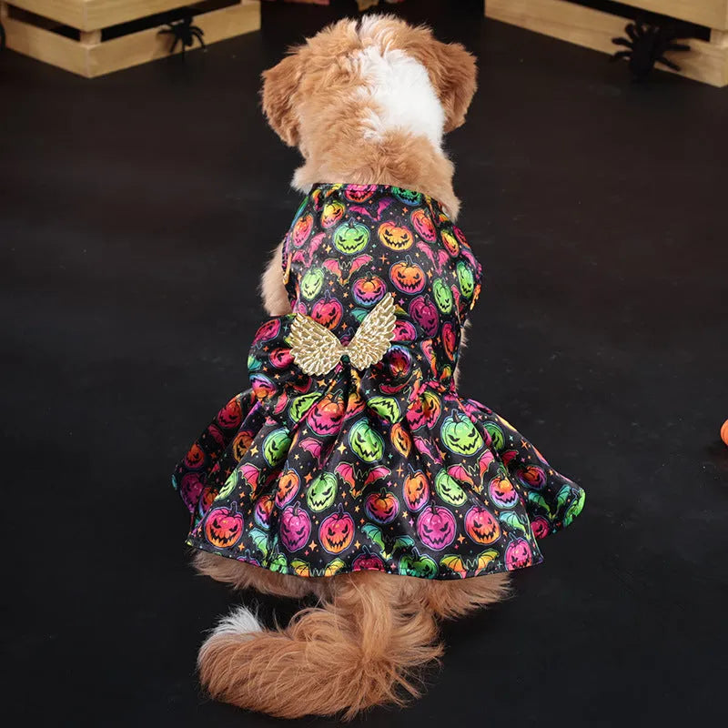 Halloween dog costume with angel wings in bright pumpkin orange and bat print patterns