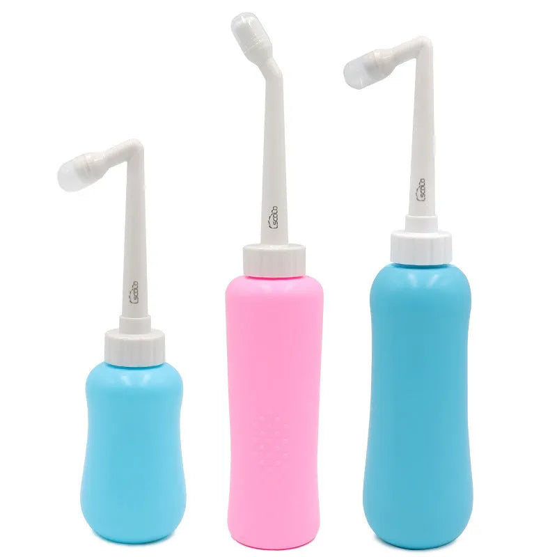 Portable female washer irrigator in blue 450ml with telescopic elbow nozzle on white background