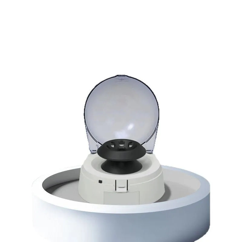 Mini laboratory centrifuge with compact 157×170×120 mm dimensions and 7000 rpm maximum speed
