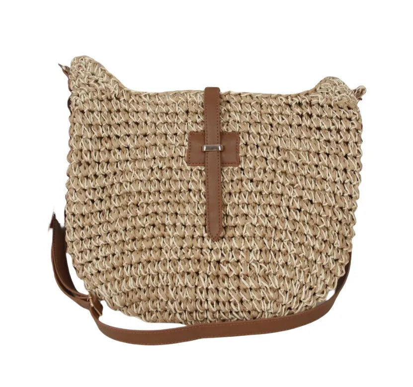 Beige handmade woven crossbody bag with a sandwich pocket and adjustable shoulder strap.