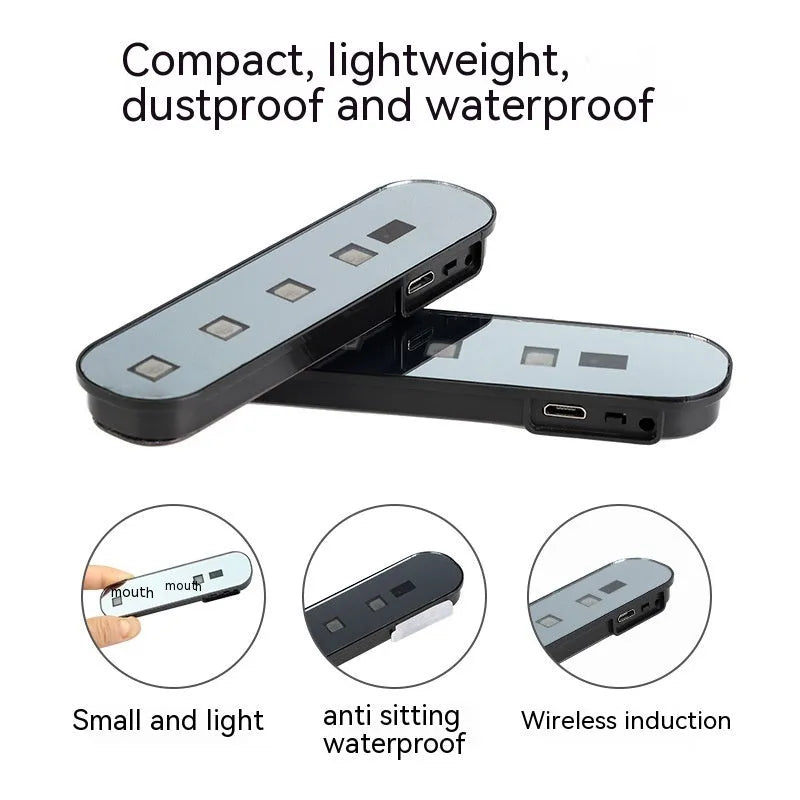 Car door induction lamp with magnetic base showing colourful T-style light projection on ground