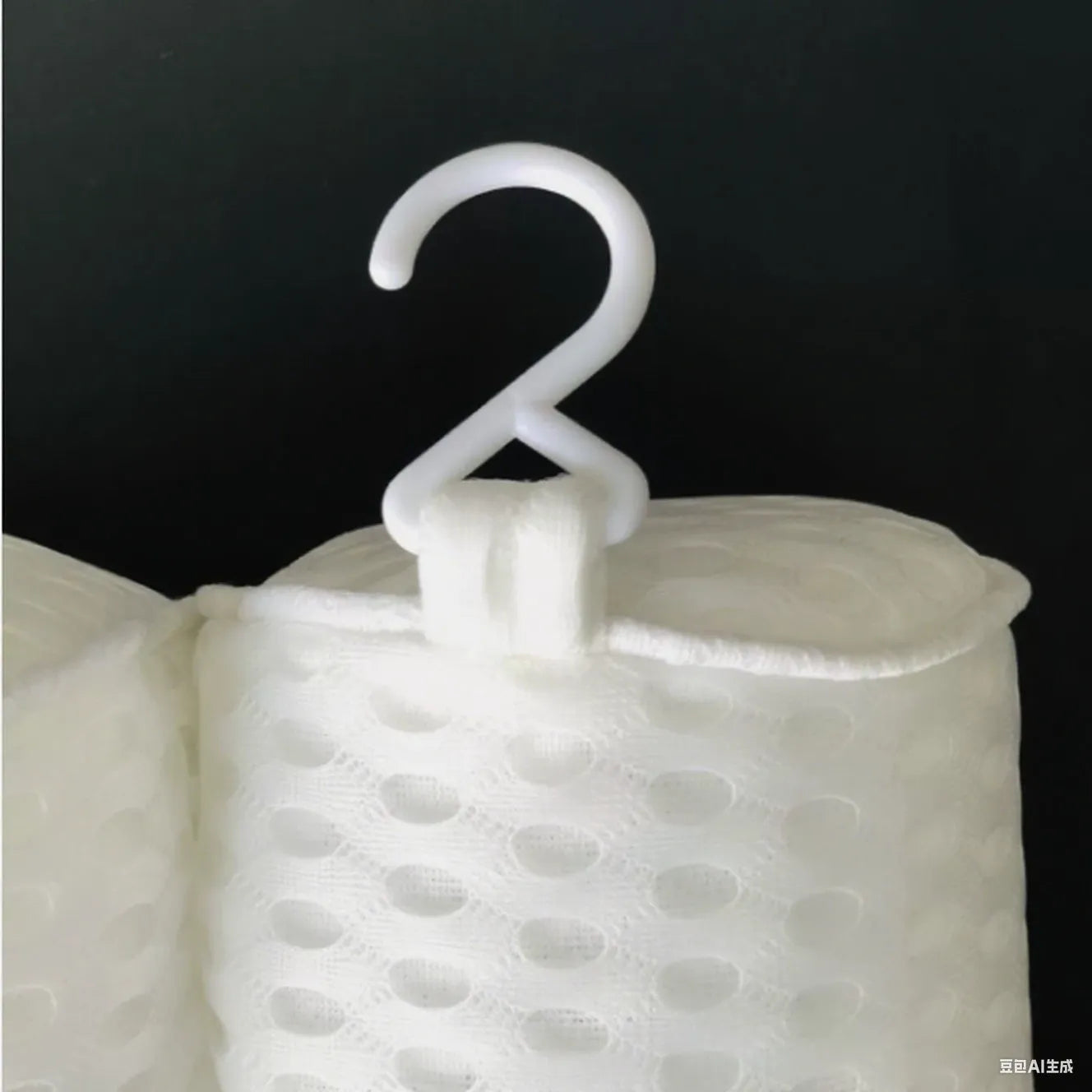 White luxury bathtub pillow with suction cups on a 4D mesh fabric surface.
