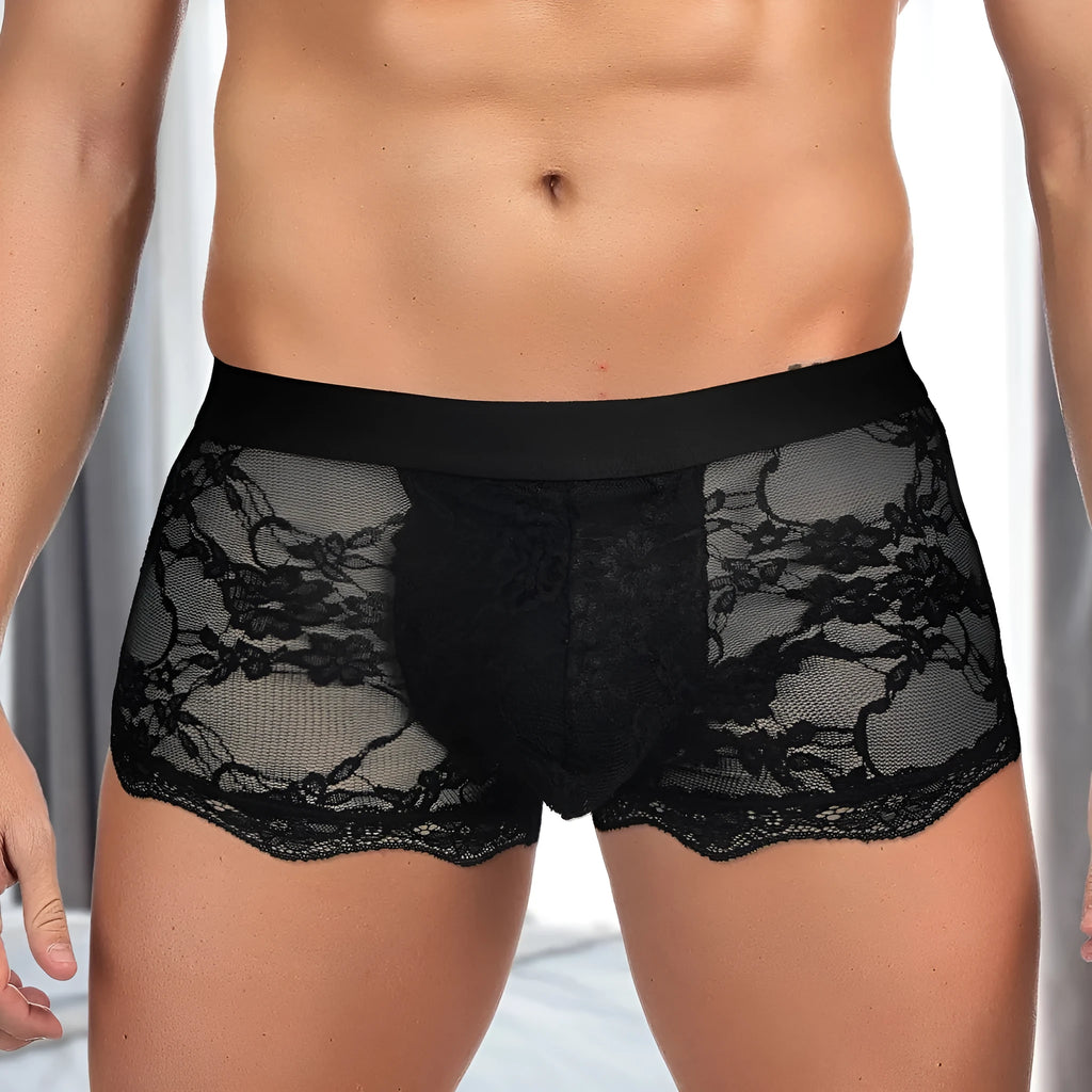 Men's black lace briefs with hollow out see-through design showing nylon fabric construction