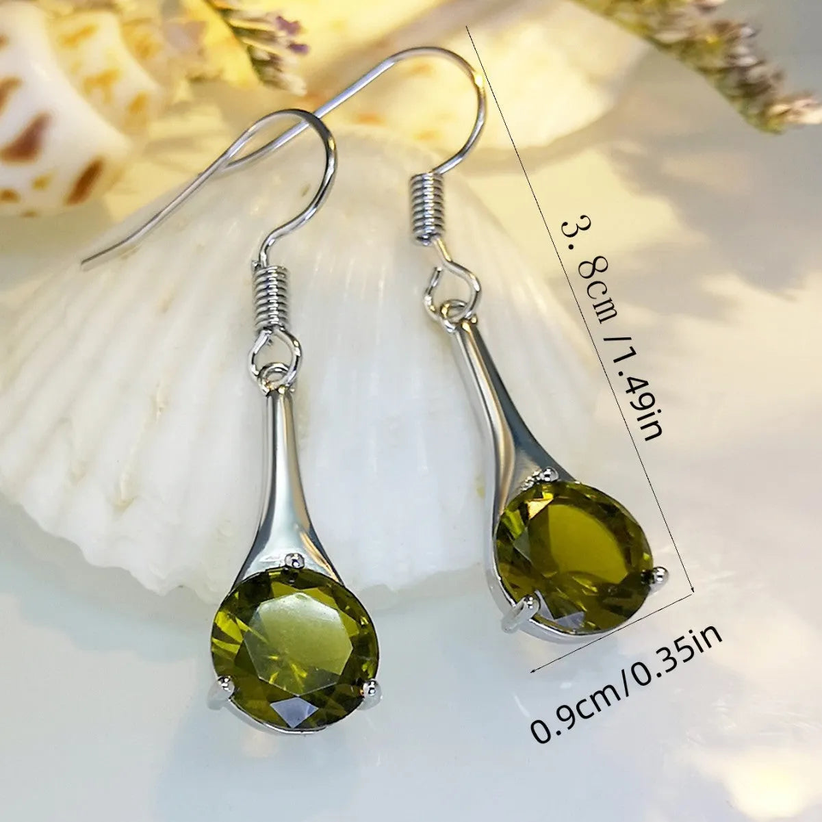 Olive green retro-style drop earrings with a minimalist water drop shape on a white background.