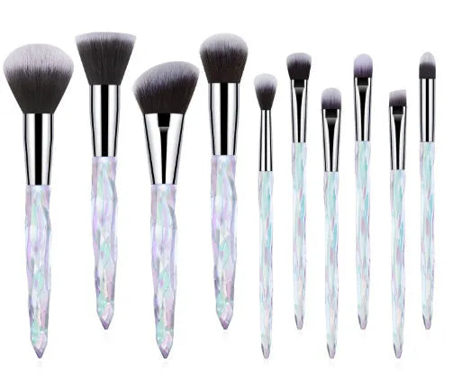 Set of ten clear crystal-handled foundation brushes with synthetic bristles in a choice of colours.