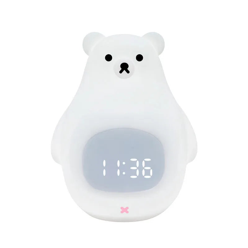White bear-shaped silicone night light with a remote control and alarm clock features.