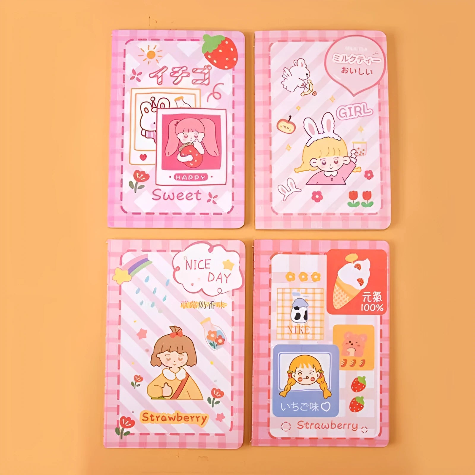 Colourful cartoon A5 notebook with 30 sheets, showing Strawberry Rabbit and Kumamoto Rabbit design options.