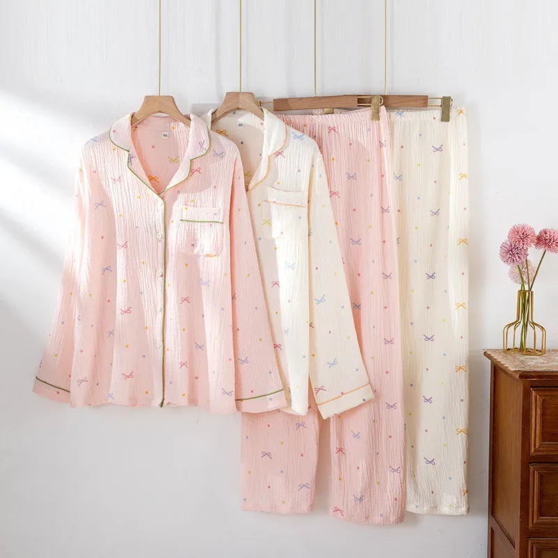 Women's cotton pajama set in pink or beige with long sleeves and matching trousers