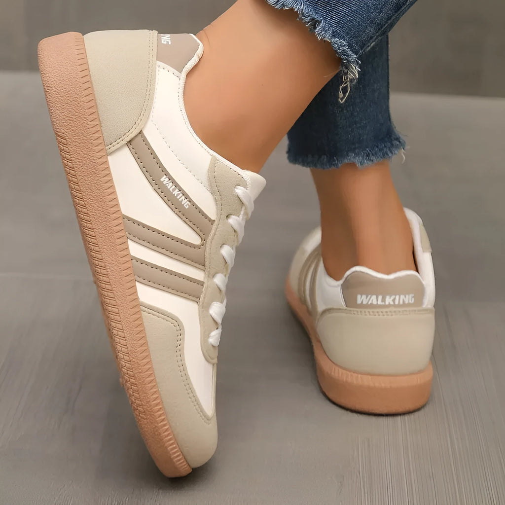 Women's retro casual training sneakers in a low-top style with a lace-up front and round toe.