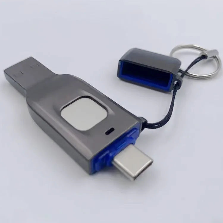 Black fingerprint encrypted USB drive with USB 3.0 and USB-C interfaces showing metal construction