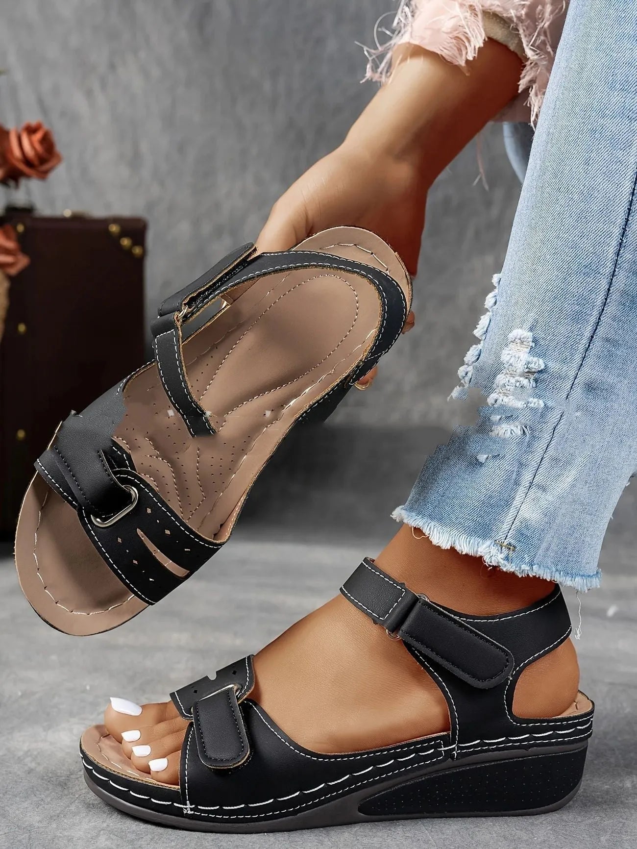 Women's thick bottom strap sandals with Velcro fastening in beige colour showing round toe and composite sole