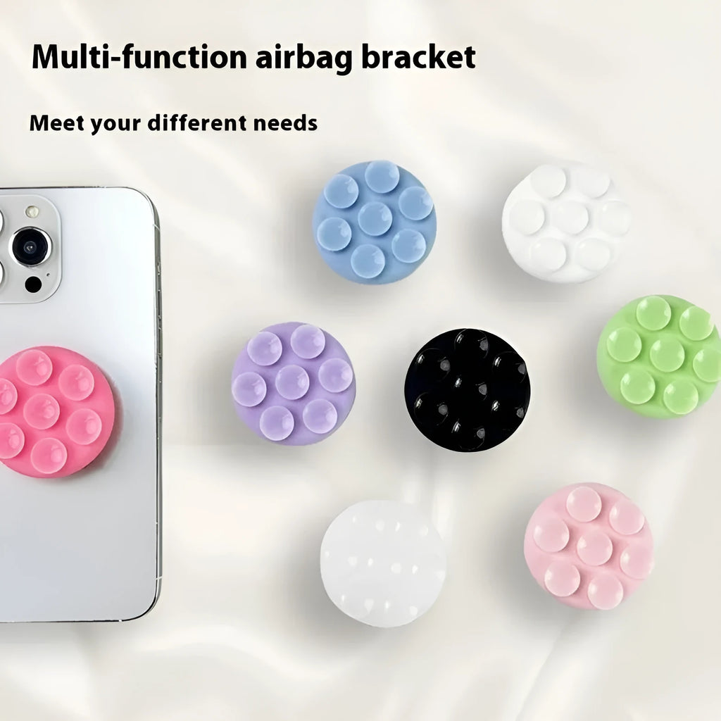 Universal silicone phone airbag bracket detachable foldable suction cup stand on a table for short video recording