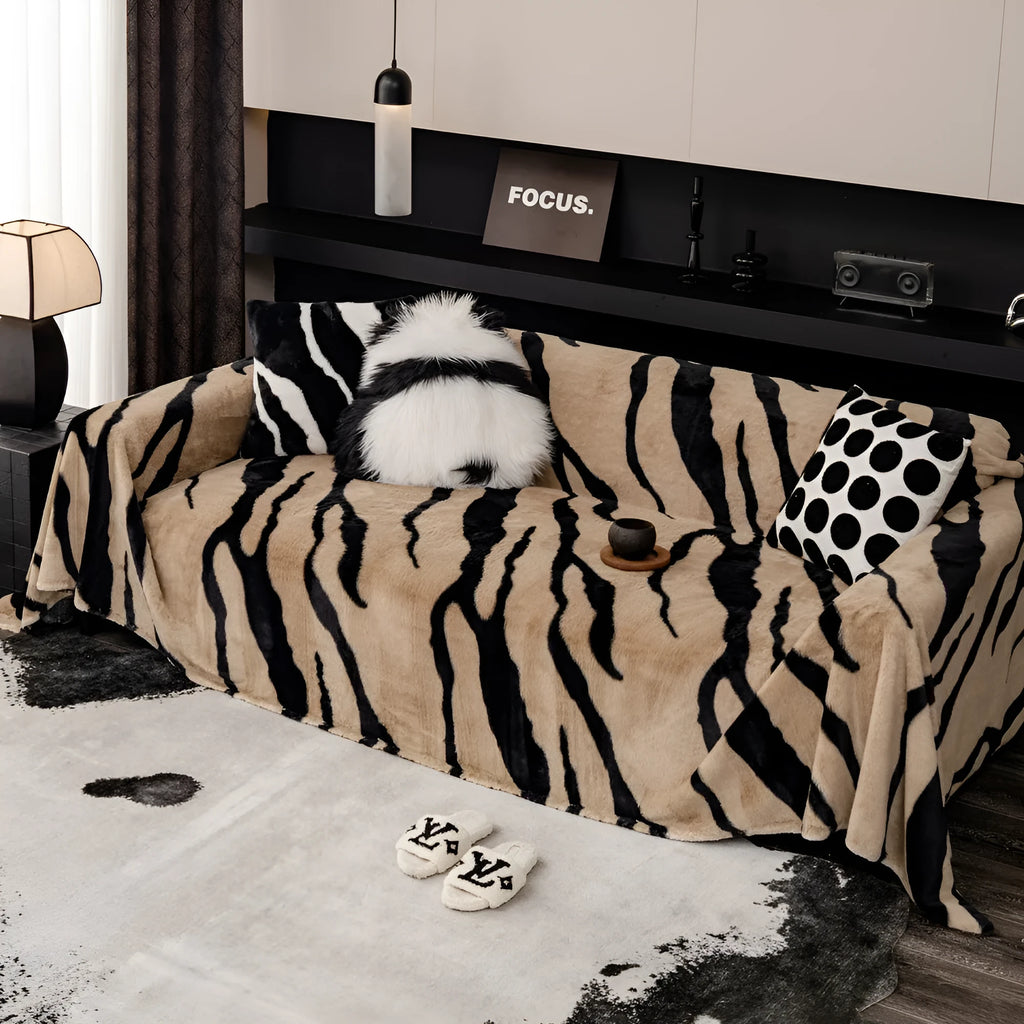 Zebra pattern flannel sofa cover with non-slip design in caramel colour showing texture and sizing