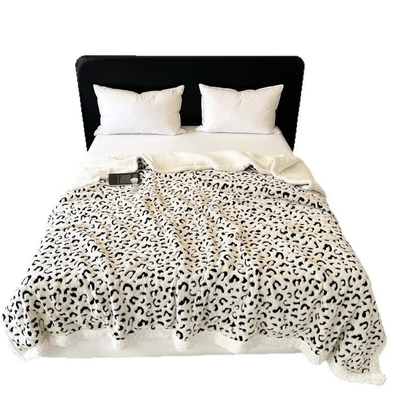 Double-layer cationic jacquard taffeta blanket with leopard print pattern in camel colour