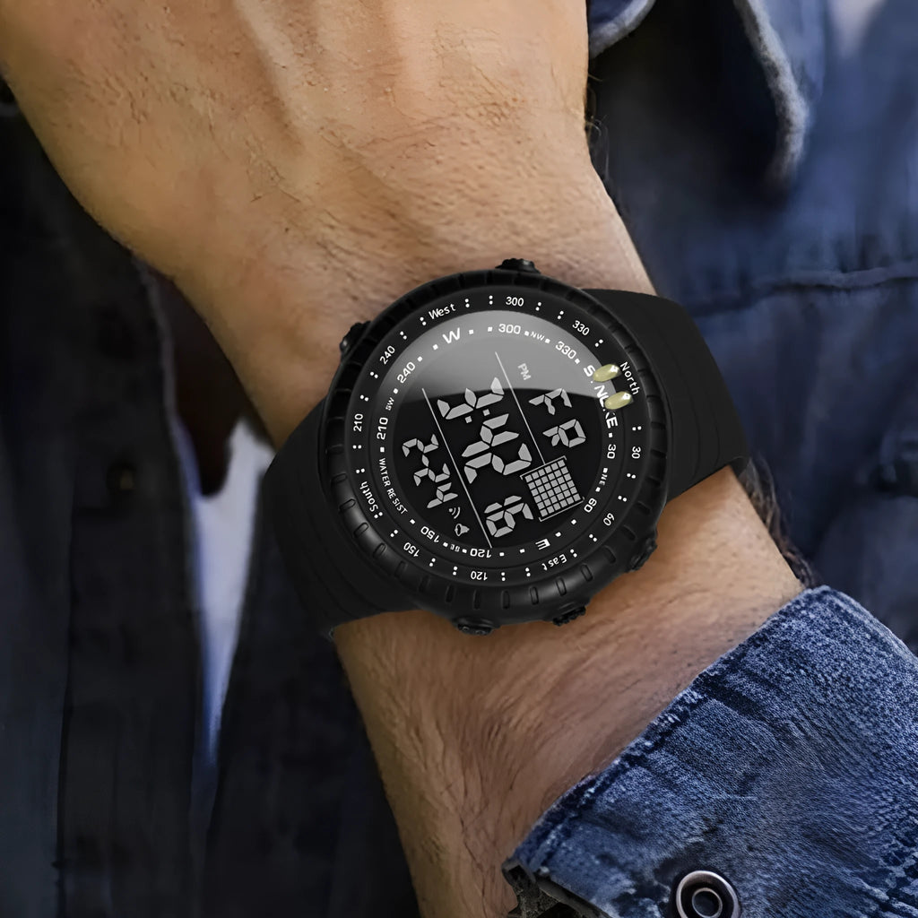 Black digital waterproof watch with large 54.74mm dial and textured PU strap on a wrist