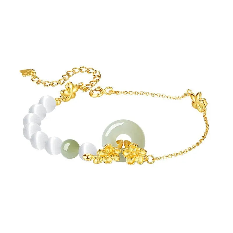 Pure silver peach blossom bracelet for women with a safety buckle in a gold electroplated finish.