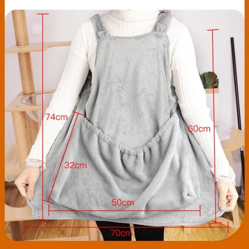 Beige plush pet carrier apron with adjustable neck strap and pet head opening