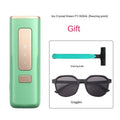 Laser hair remover permanent freezing point sapphire home use device in dark green or green, 150x67x36mm, with sunglasses and shaving knife.