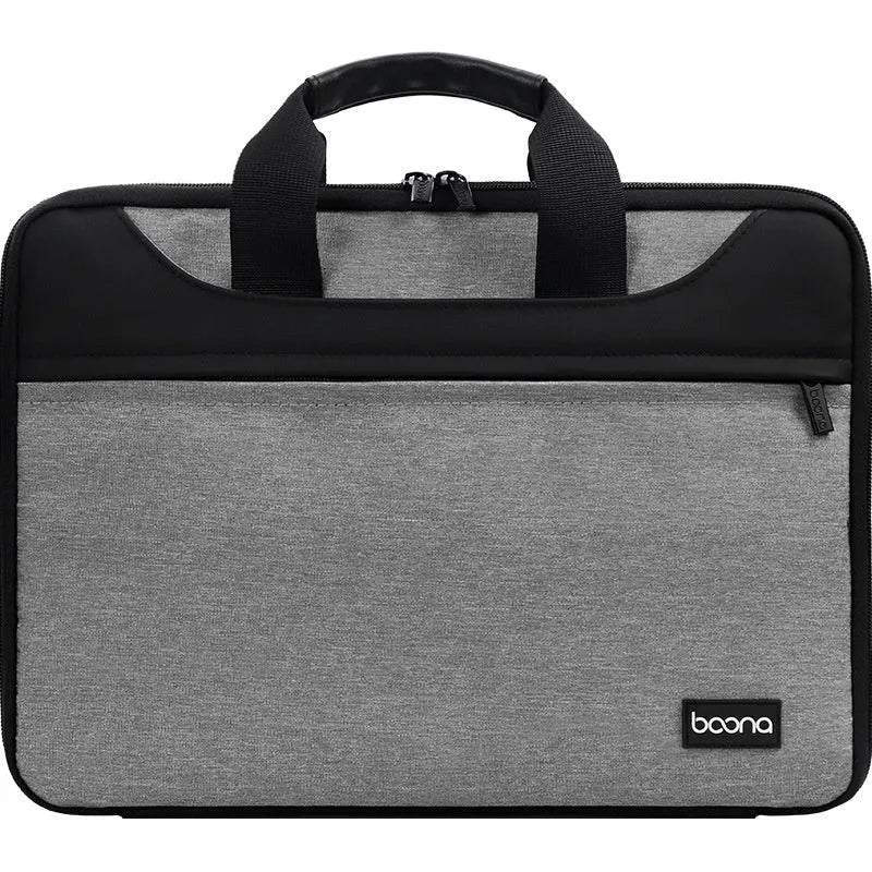 Black Oxford cloth laptop shoulder bag with soft carry handle for business travel.