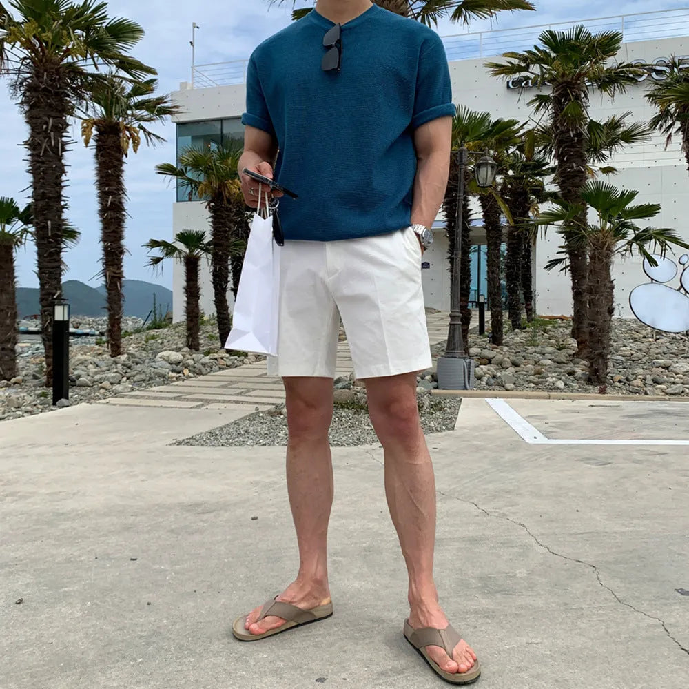 Men's loose straight casual shorts in black, white, and khaki solid colours made from polyester fabric