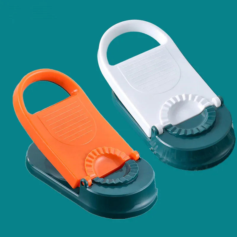 Orange and white plastic dumpling maker tool with ergonomic handle and hanging hole