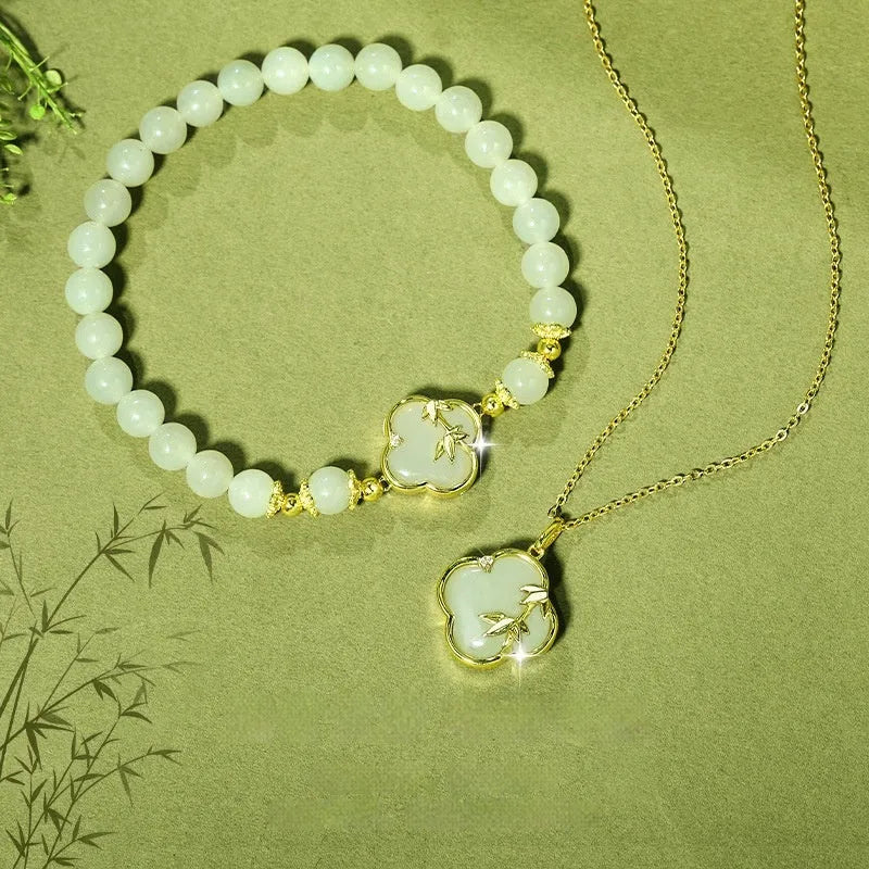 Hetian jade bracelet and necklace set with silver leaf inlay in national style design