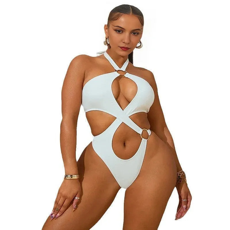 Women's white sleeveless jumpsuit with lace-up back and tapered shorts on hanger