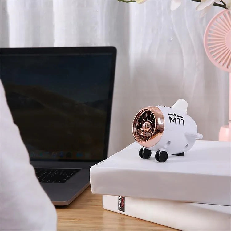 Mini Bluetooth wireless speaker in multiple colour options showing compact size