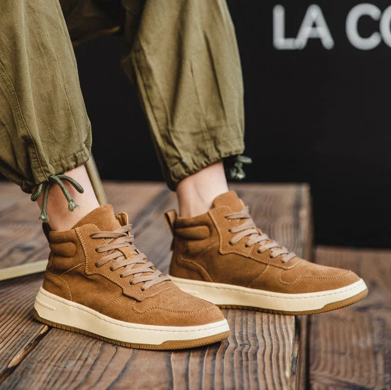 Brown cowhide mid-top Martin boots for men with front lace-up, beef tendon sole and 7-11cm middle mouth.