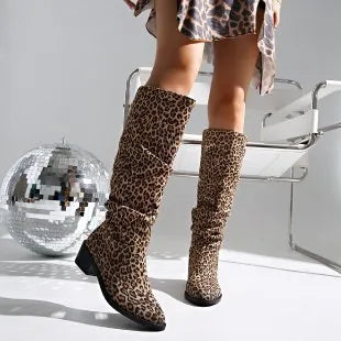 Brown leopard print women's boots with a square toe and chunky mid-height heel.